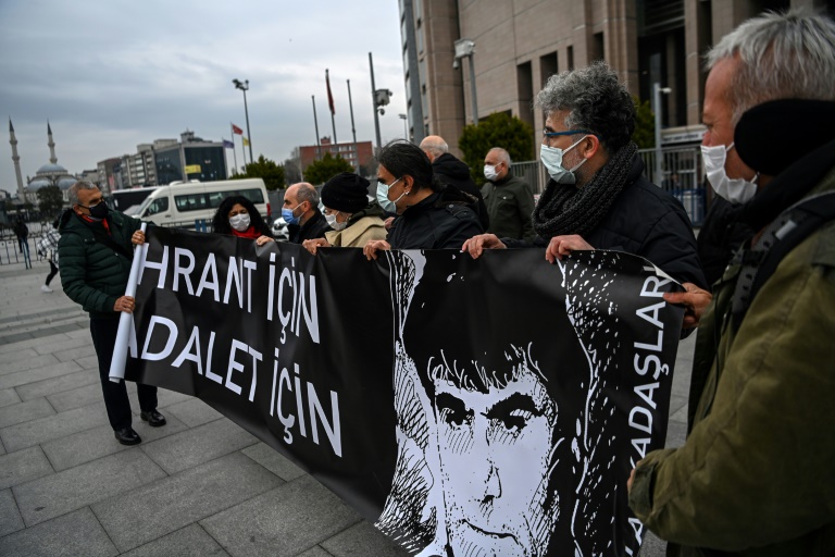 AFP - Demonstrators held banners reading "For Hrant, For Justice" in front of the Istanbul court