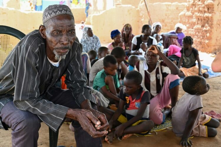 AFP | Belem Boureima, a 74-year-old farmer, and his family. They are among more than a million people who have fled their homes since Burkina Faso's jihadist insurgency began in 2015