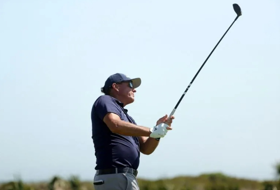 Phil Mickelson seized two-stroke lead after the front nine in Sunday's final round of the PGA Championship | AFP