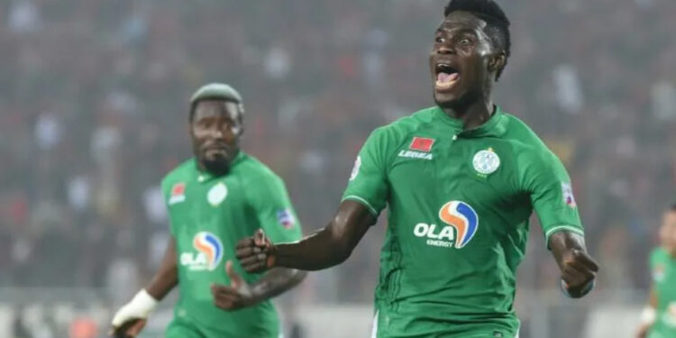 Raja Casablanca forward Ben Malango (R) increased his CAF Confederation Cup goal tally to five after scoring twice against Orlando Pirates on Sunday | AFP