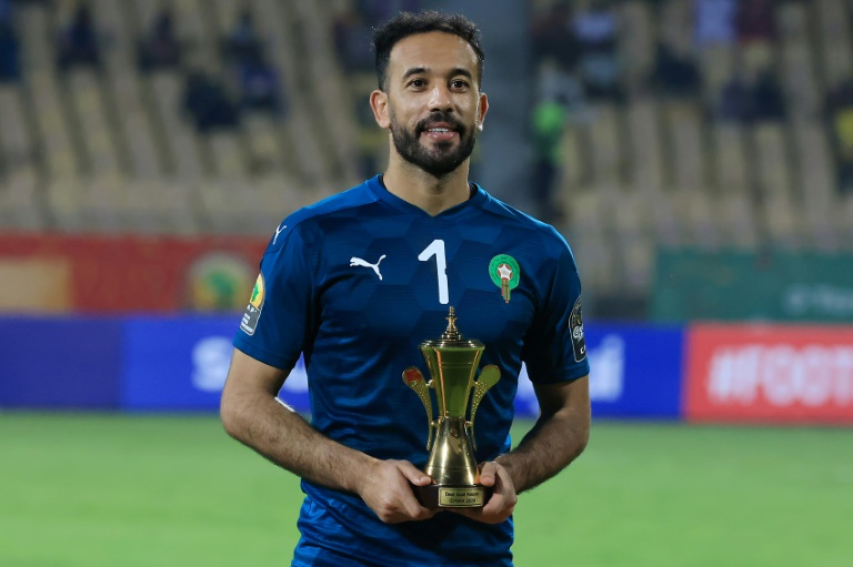 Morocco and Raja Casablanca star Anas Zniti holds the trophy awarded to the best goalkeeper after the African Nations Championship in Cameroon this year | AFP