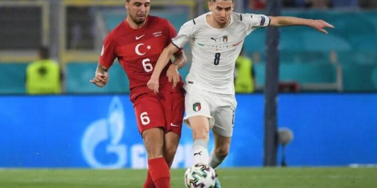 Italy midfielder Jorginho (R) won the Champions League with Chelsea | AFP