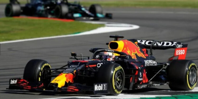 Red Bull's Dutch driver Max Verstappen leads Mercedes' British driver Lewis Hamilton | AFP