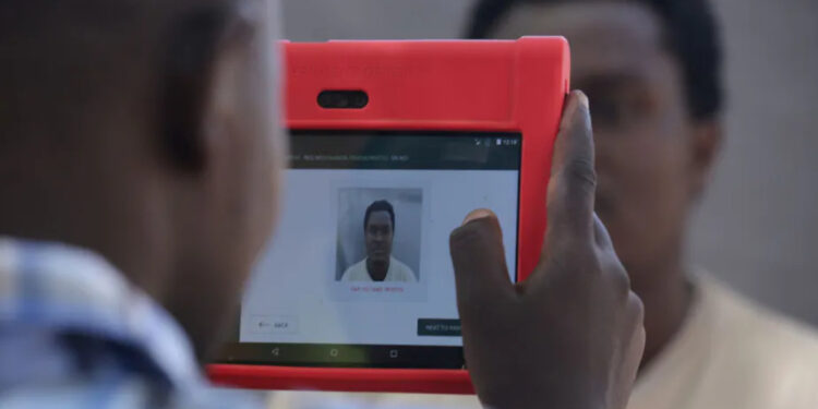 An officer of the National Integrated Identity Management system collects data for Mr Charles Chepkwony’s digital ID in 2019 in Baringo, Kenya. Photo by Billy Mutai/SOPA | Images/LightRocket via Getty Images