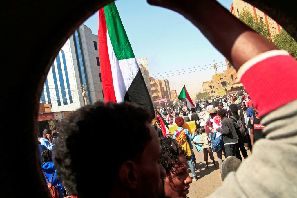 Sudanese rally against last year's military coup and Sudanese rally against last year's military coup and demand civilian rule in Khartoum braving tear gas from security forces | AFP