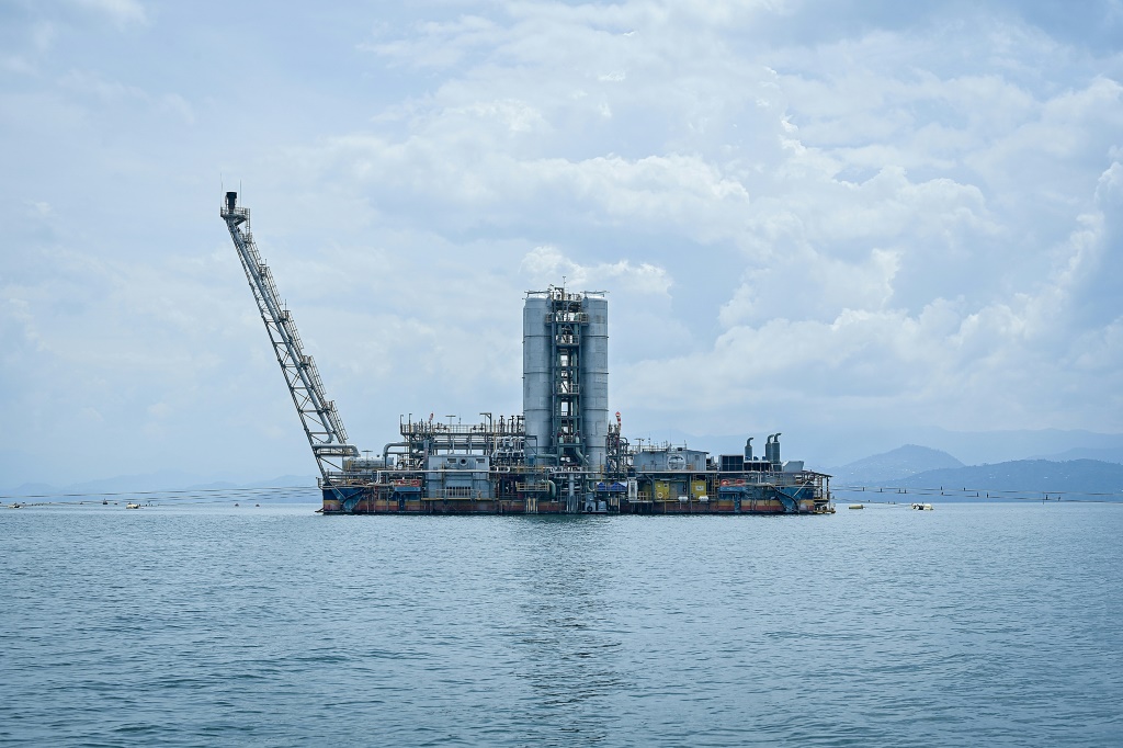 On Lake Kivu, lying between Rwanda and the Democratic Republic of Congo, the KivuWatt company extracts gas from the lake's waters for electricity | AFP