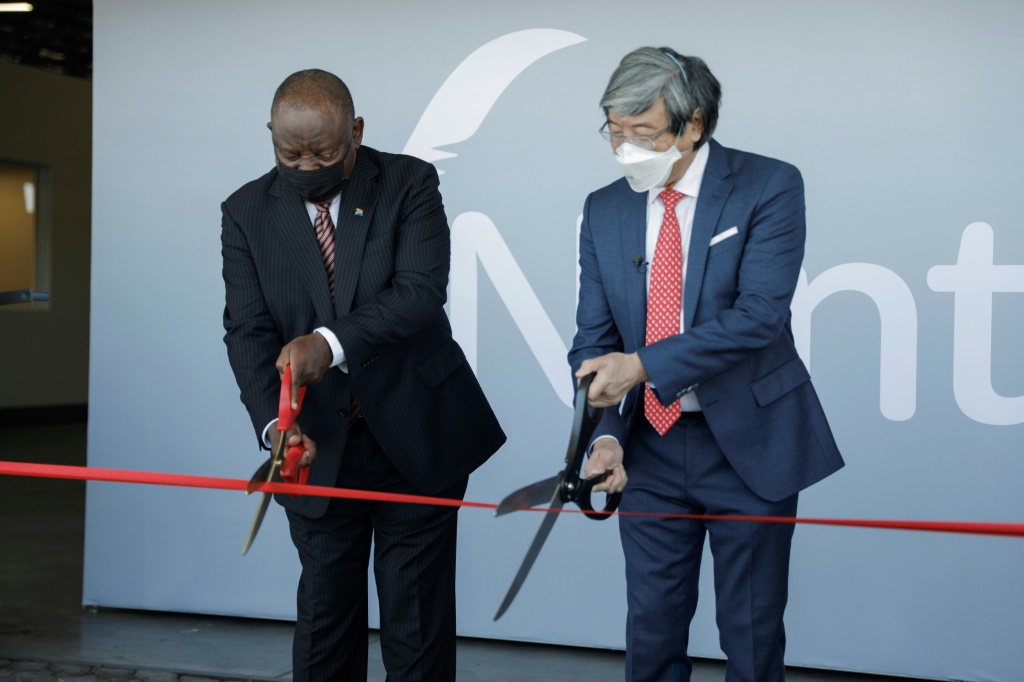 Scissor ceremony: President Cyril Ramaphosa, left, joins biotech tycoon Patrick Soon-Shiong in launching the vaccine hub | AFP