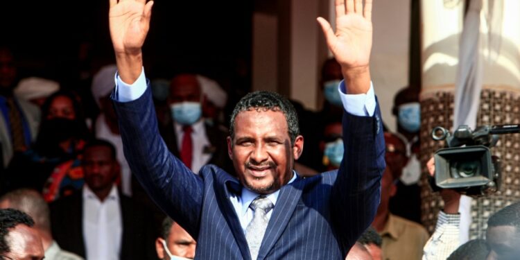 Mohamed Hamdan Daglo, widely known as Hemeti and who is number two in Sudan's ruling council, seen here in a October 2020 photograph, flew to neighboring Ethiopia Saturday amid border tensions | AFP