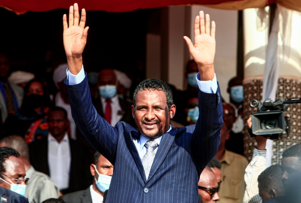 Mohamed Hamdan Daglo, widely known as Hemeti and who is number two in Sudan's ruling council, seen here in a October 2020 photograph, flew to neighboring Ethiopia Saturday amid border tensions | AFP