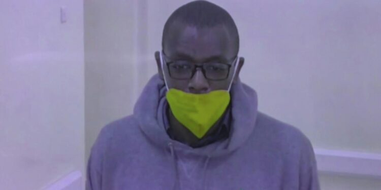 The author was first detained in late December on charges of offending the Ugandan president and his son | AFP