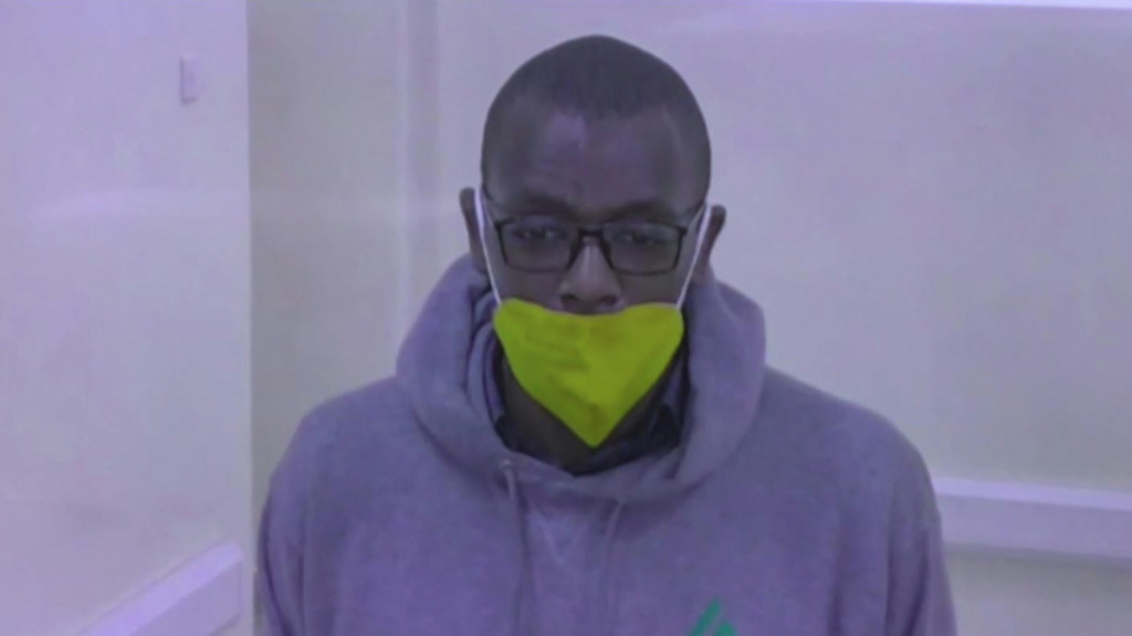 The author was first detained in late December on charges of offending the Ugandan president and his son | AFP