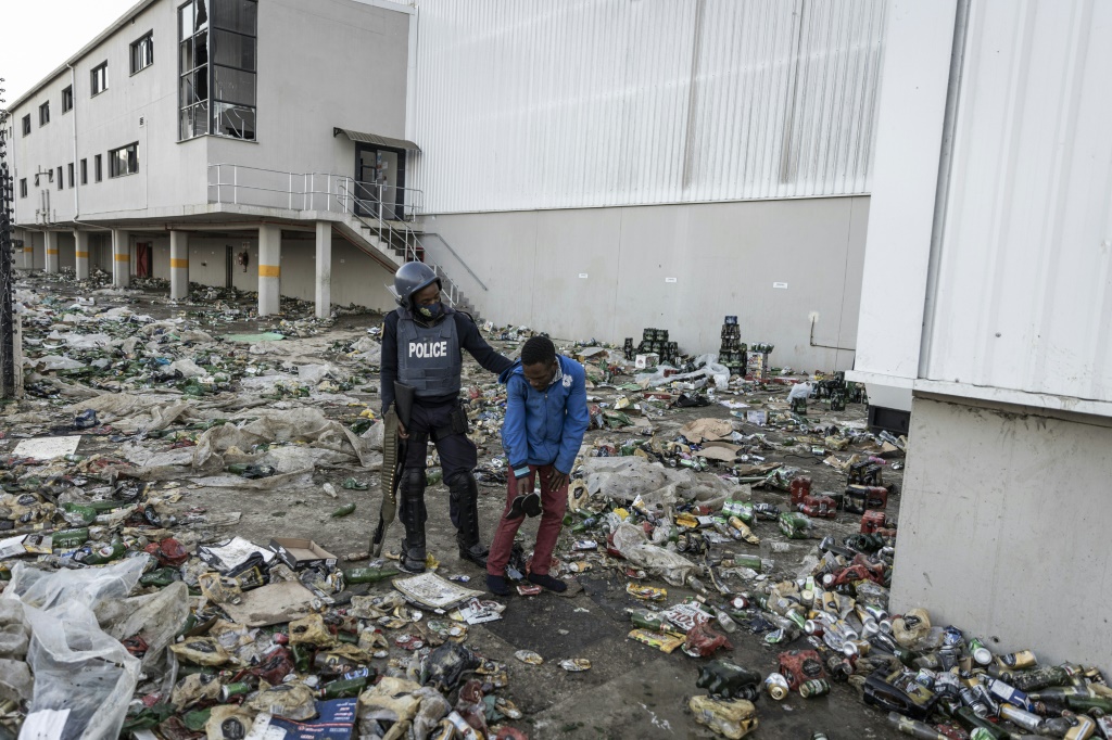Riots instigated by former president Jacob Zuma's supporters cast a harsh light on the weaknesses of the criminal justice system on the streets | AFP