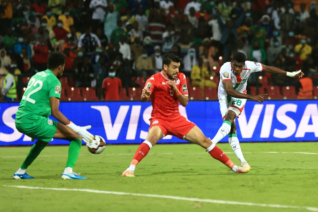 Dango Ouattara (R) scores for Burkina Faso in an Africa Cup of Nations quarter-final against Tunisia in Garoua on Saturday | AFP