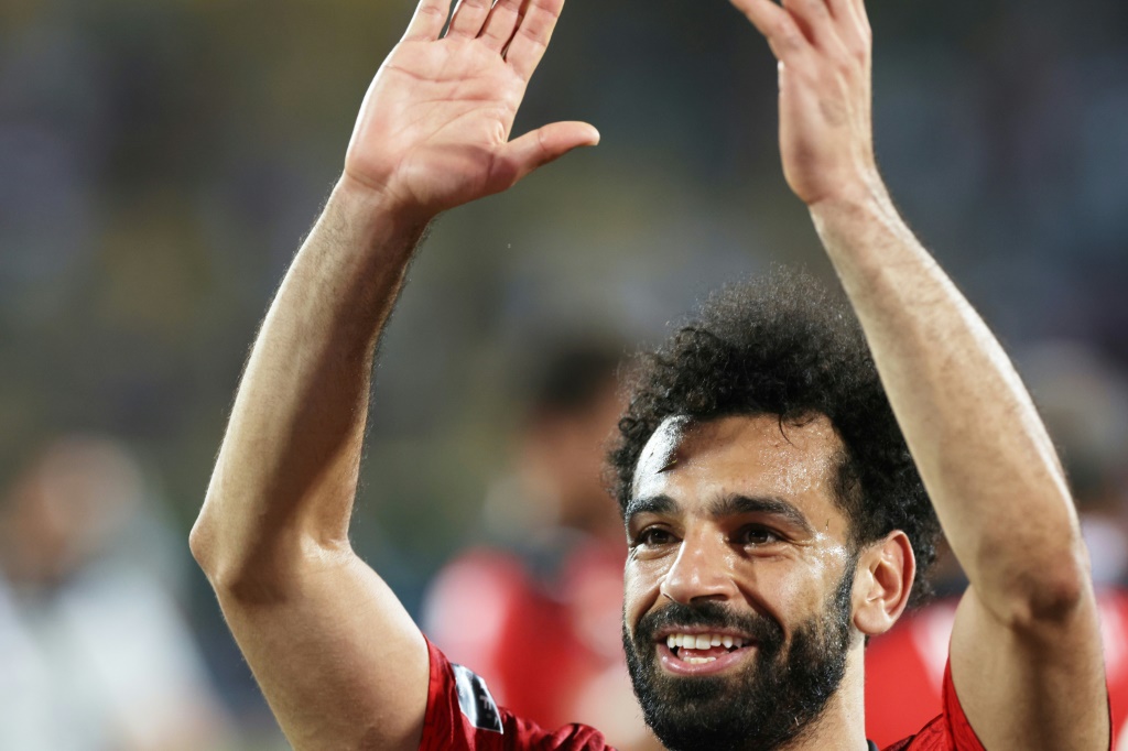 Captain Mohamed Salah acknowledges Egypt supporters after a dramatic quarter-final victory over Morocco in Yaounde | AFP