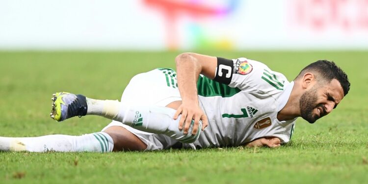 Algeria captain Riyad Mahrez is fouled during a loss to the Ivory Coast in Douala that ended their Africa Cup of Nations campaign | AFP