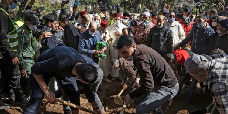 Moroccans bury five-year-old Rayan Oram in the village of Ighrane in Morocco's rural northern province of Chefchaouen | AFP