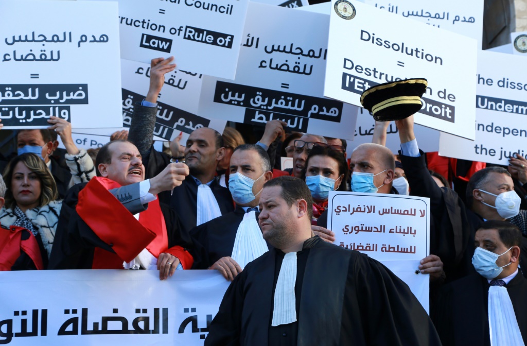 Tunisian judges have denounced President Kais Saied's move to dissolve a key judicial watchdog as a violation of rights and freedoms | AFP
