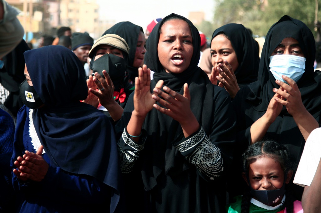 Sudanese women chant slogans calling for civilian rule and denouncing the military administration on February 10 | AFP