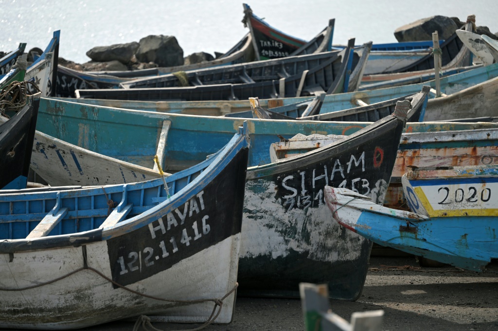 African migrants try to reach Spain's Canary Islands aboard open canoes known as pirogues. Pictured: a 'boat graveyard' at Arinaga on Gran Canaria island | AFP