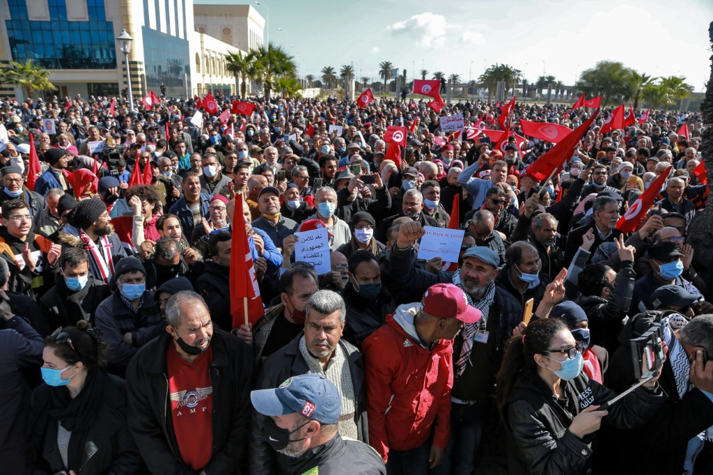 Tunisians protest against a power grab by President Kais Saied who on Sunday extended his control of the judiciary | AFP