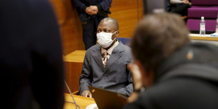 Sierra Leonean national Gibril Massaquoi, seen at the first day of his trial on February 3, risked life in prison in the case of a guilty verdict | AFP