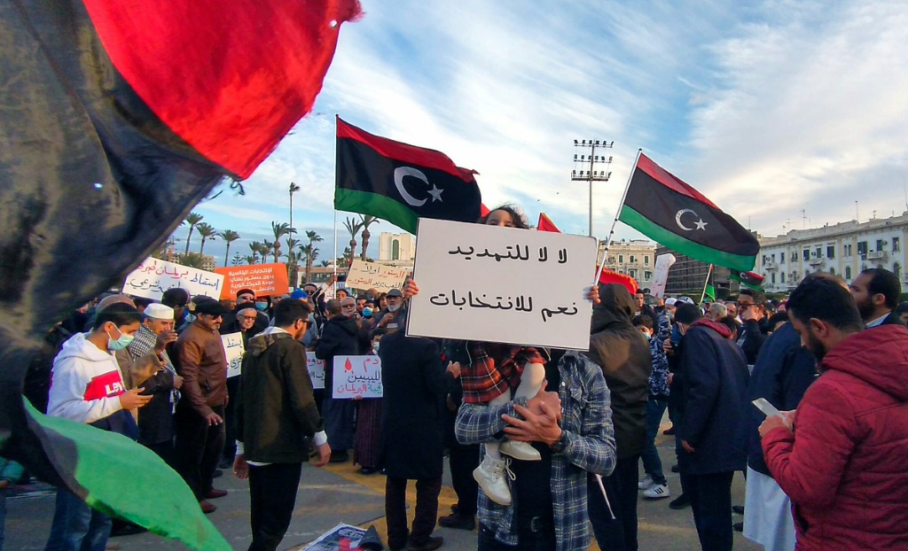 Libyans demonstrate in the capital Tripoli on February 11 to demand elections | AFP