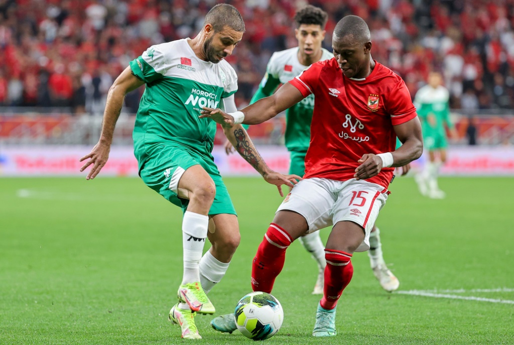 Raja Casablanca midfielder Mohsine Moutaouali (L) led the Moroccan club to a 1-0 win over Entente Setif | AFP