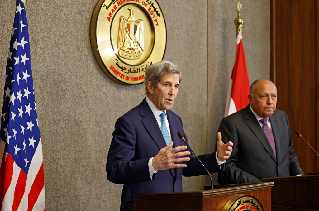 United States climate envoy John Kerry, on the left, and Egypt's Foreign Minister Sameh Shoukri hold a joint press conference in the capital Cairo, on February 21, 2022 | AFP