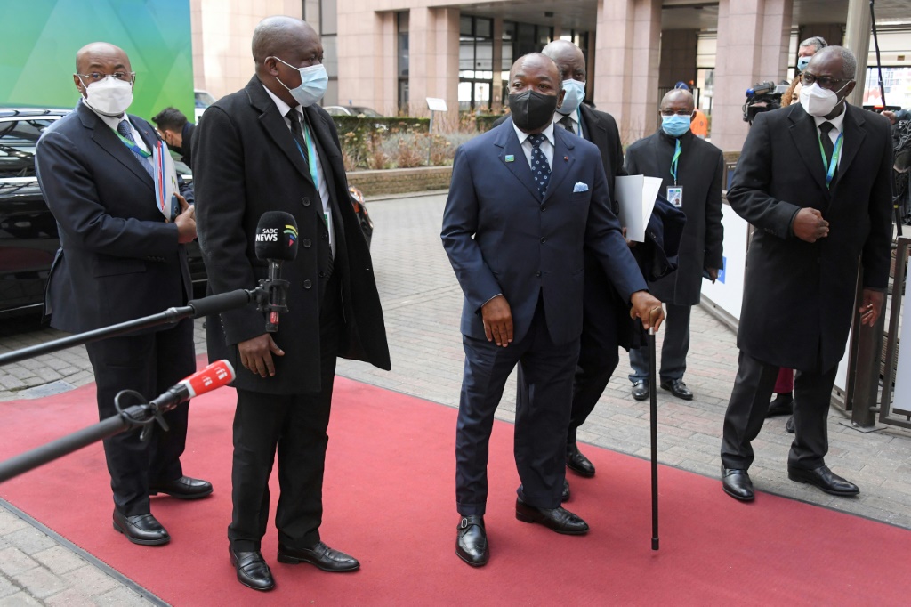 Bongo, pictured center with a stick, at last week's Europe-Africa summit in Brussels | AFP