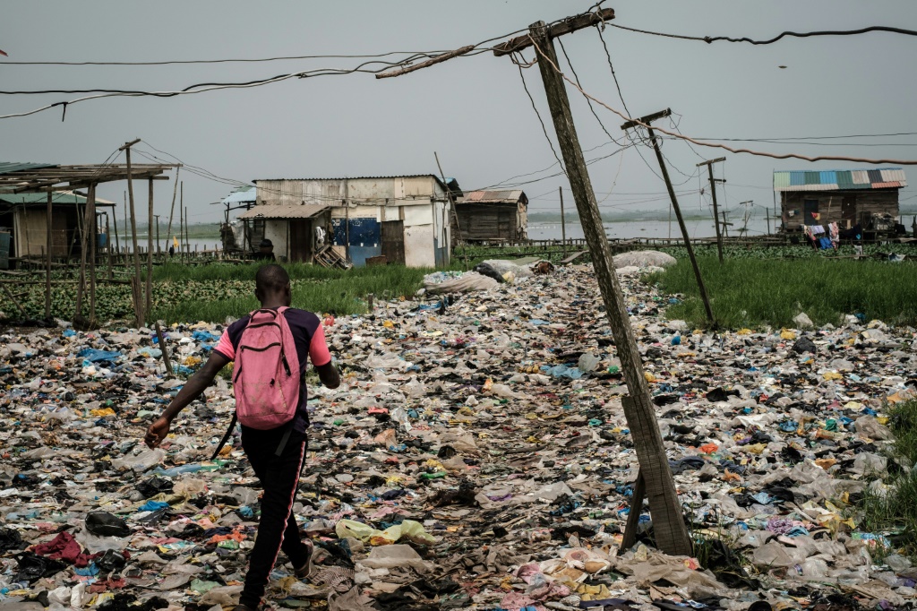 African cities are scarred by huge landfills where plastic waste is measured in the thousands of tones | AFP