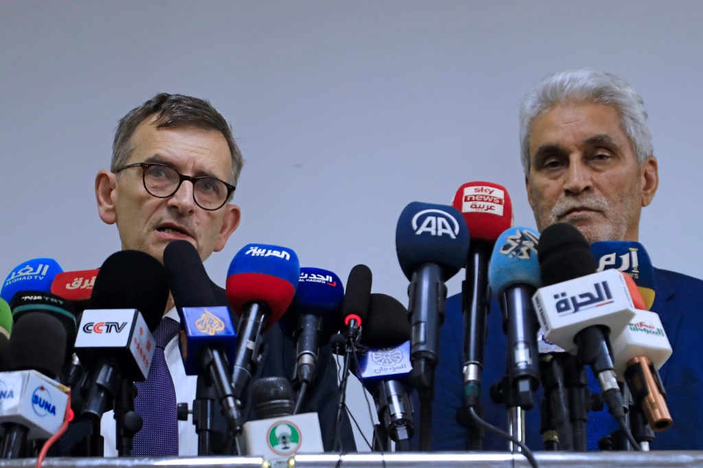 (L to R) Volker Peretz, special representative of the United Nations to Sudan, and Mohamed Lebatt, special envoy of the African Union, address a news conference in Khartoum | AFP