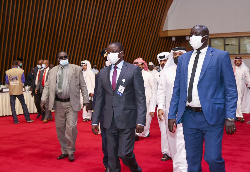 Chad's Prime Minister Albert Pahimi Padacke arrives at the start of peace talks in Doha on Sunday | AFP