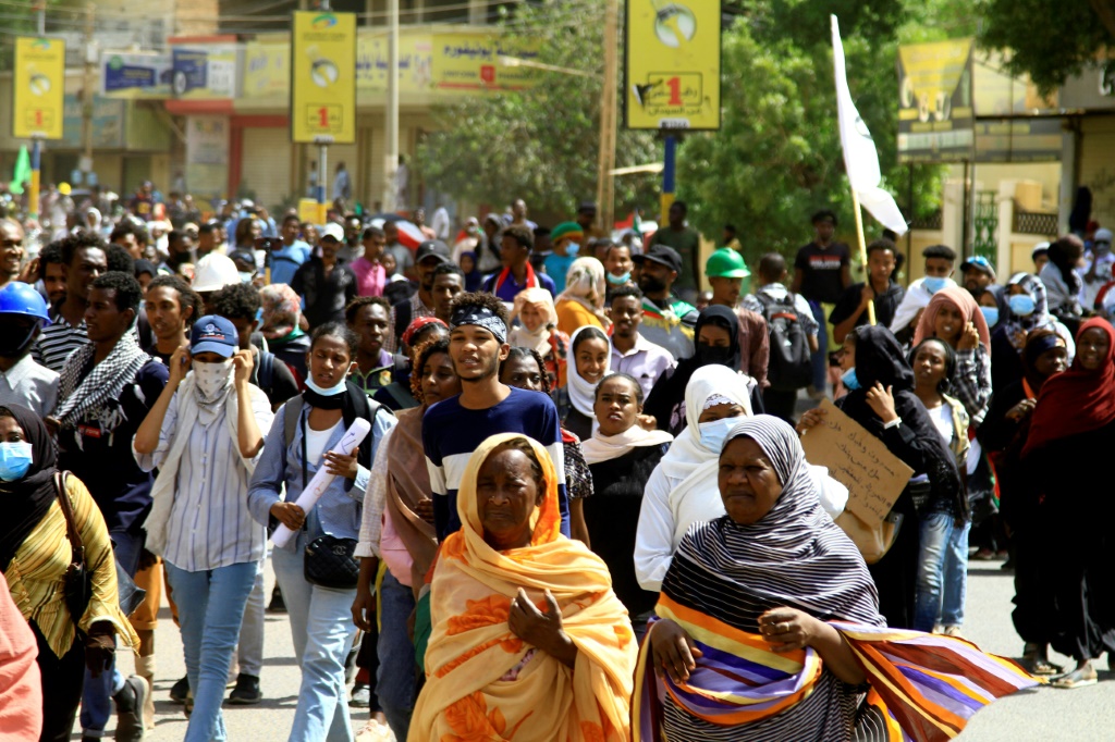 Sudanese protesters take part in ongoing demonstrations calling for civilian rule, in Sudan's capital Khartoum on March 14, 2022 | AFP