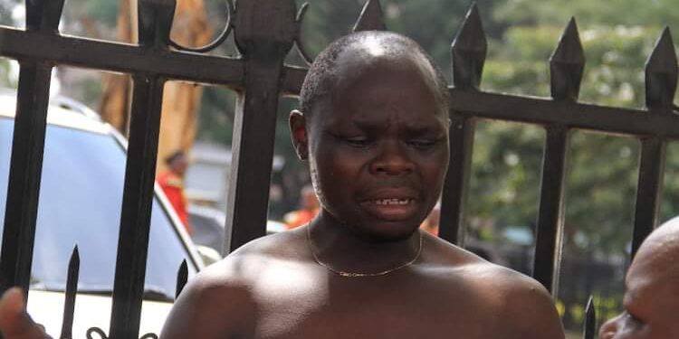 The man who claims to be retired president Mwai Kibaki's grandson at Parliament Buildings