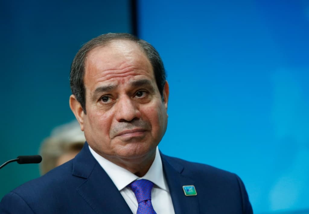 Egypt's President Abdel Fattah Al-Sisi, seen at a February 2022 summit in Brussels, has been urged by the United States to probe the death of a prominent economist | AFP