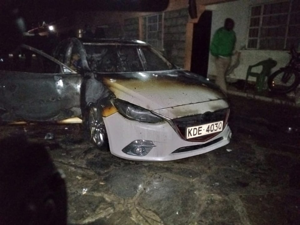 Philippe Sadja's vehicle was torched by the attackers.Photo/Courtesy