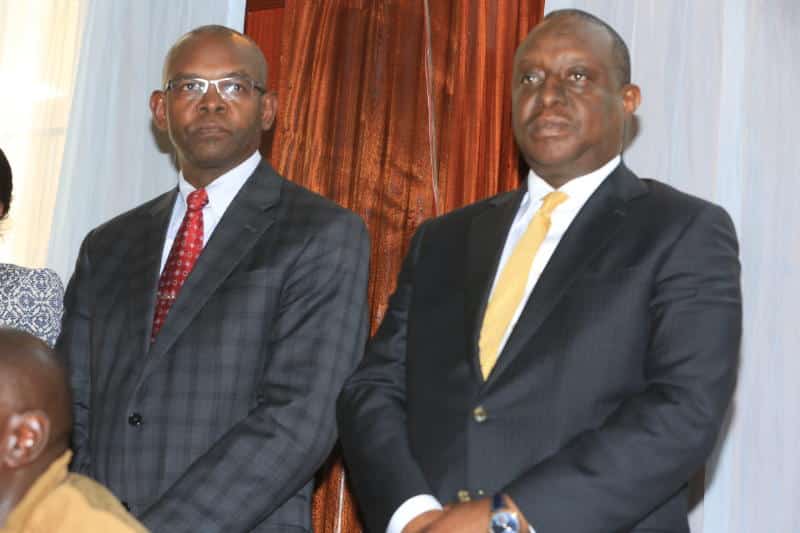 Former Treasury Cabinet Secretary Henry Rotich and Principal Secretary Kamau Thugge at Milimani Anti-corruption Court.
Photo: The Standard