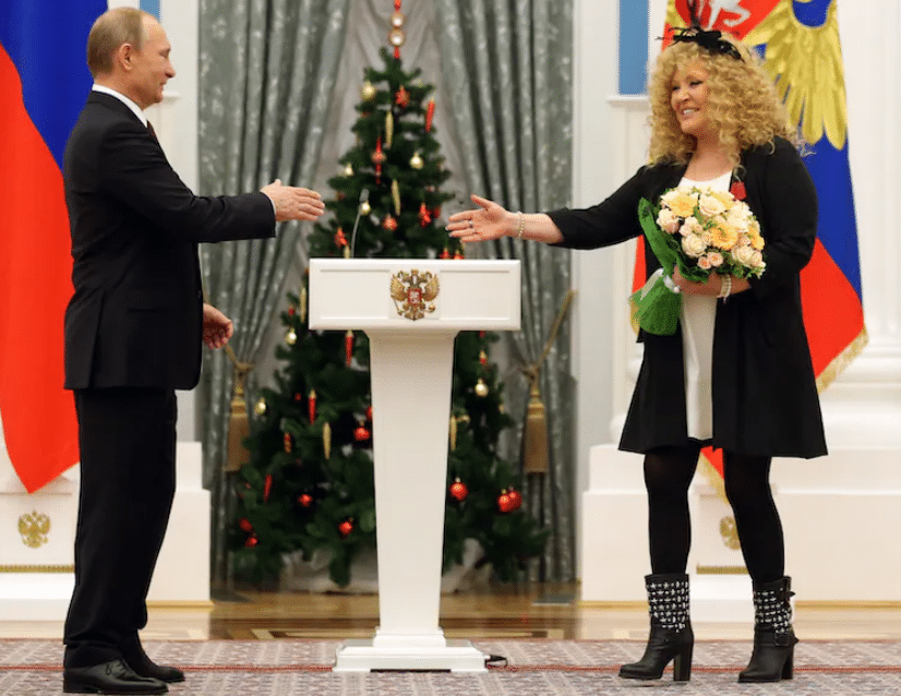 Russian President Vladimir Putin greets Alla Pugacheva during a 2014 awards ceremony honoring the pop singer with the Order for Merit to the Fatherland |  Sasha Mordovets/Getty Images
