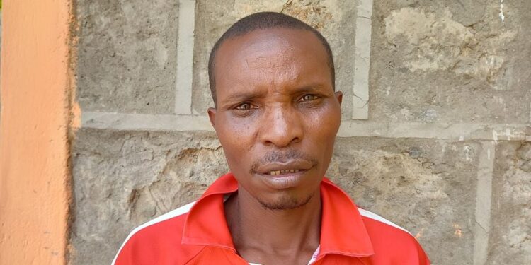 Mr Joseph Kimani whose son was nearly maimed by a group of youths after undergoing a rite of passage.Photo/Macharia Mwangi,Daily Nation