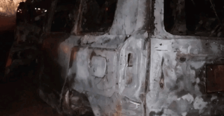 The wreckage of the car that the police officers were traveling in