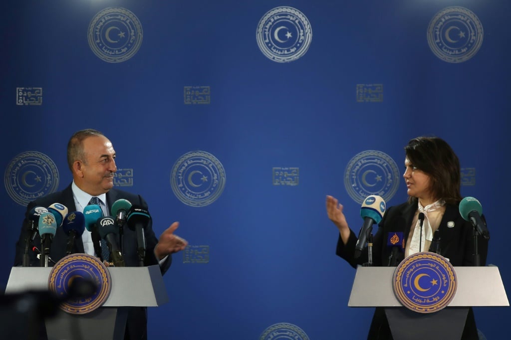 Libyan Foreign Minister Najla al-Mangoush and Turkish Foreign Minister Mevlut Cavusoglu speak to reporters after s signing a maritime gas deal | AFP