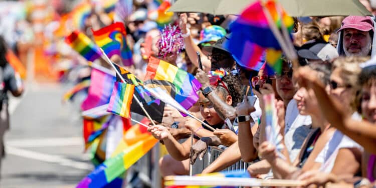 People in Pride colors attend and march during the 2022 New York City Pride March on June 26, 2022 in New York City. (Photo by Roy Rochlin/Getty Images)