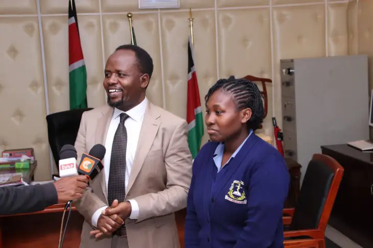 Trans Nzoia governor George Natembeya with Elizabeth Robai - the dancing pediatric nurse captured in a viral video. PHOTO/Facebook