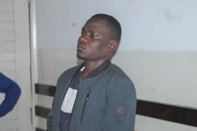 Dan Simiyu at the Kibera court.He is charged with stepping on his wife's abdomen.Photo/Courtesy