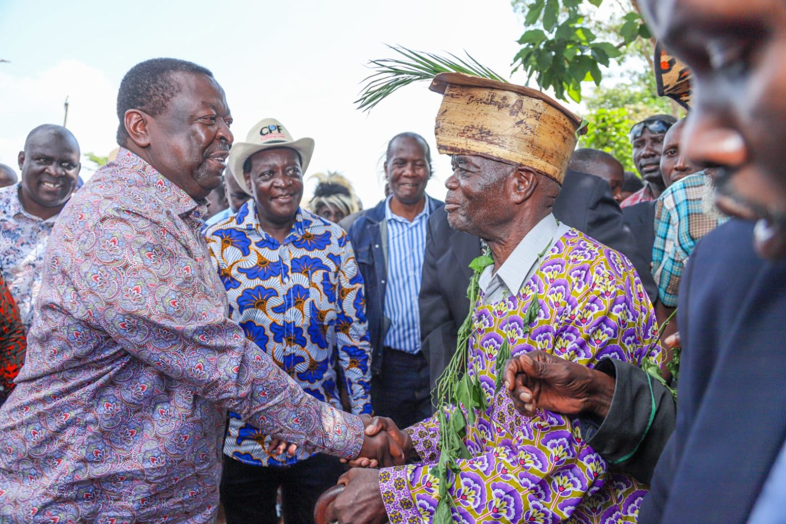 Prime Cabinet Secretary Musalia Mudavadi greets an elder during the 43rd Vihiga Cultural Festival on December 25, 2022. Photo/Courtesy