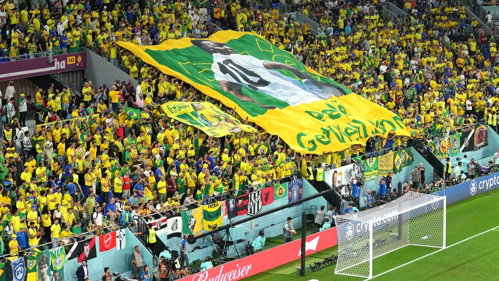 Brazilian fans showing a flag featuring football legend Pele saying 'Get well soon'
Photo: Courtesy