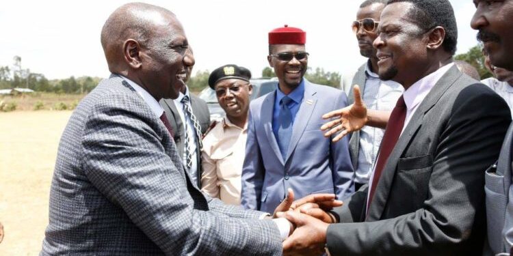 President William Ruto greets Sirisia MP John Waluke during a leaders meeting in Kakamega on Thursday.Photo/Courtesy