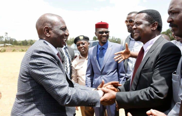 President William Ruto greets Sirisia MP John Waluke during a leaders meeting in Kakamega on Thursday.Photo/Courtesy
