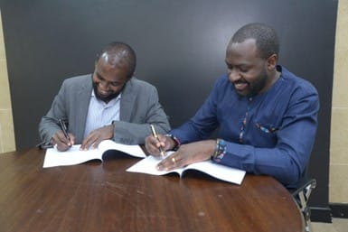 Ebenezer Degu, CEO Workstyle Africa (L) and Joram Mwinamo, CEO SNDBX (R), during the signing of a partnership MOU. Photo/Workstyle Africa