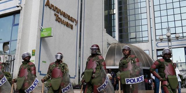 Anti-riot police officers guard Anniversary towers during a past protest by opposition leaders.Photo/Courtesy